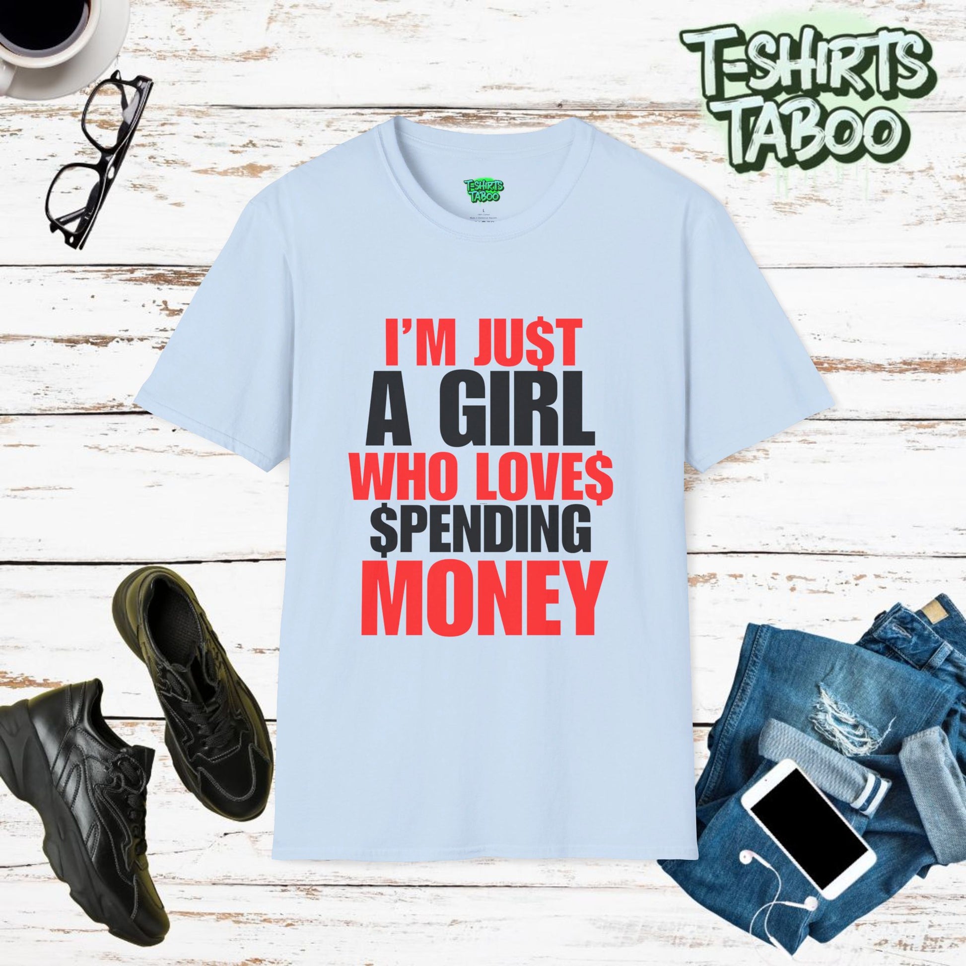 Stylish and unique, bold statement T-shirt by T-shirts Taboo showing the slogan I’m just a girl who loves spending money. Clear and bold text only statement t-shirt.