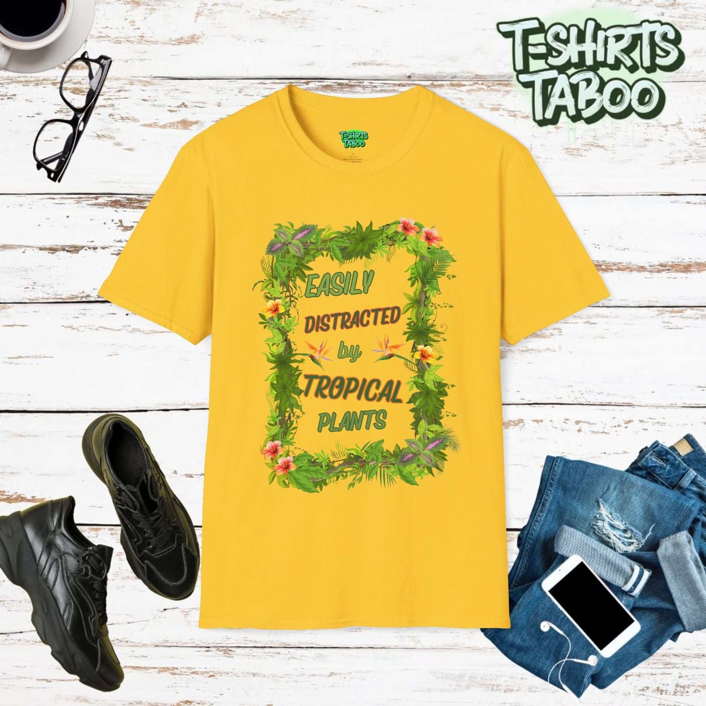 Our Range of Tropical Style Gardening tees. This tee is featuring a stunning display of tropical plants design with bold slogan Easily Distracted by Tropical Plants.