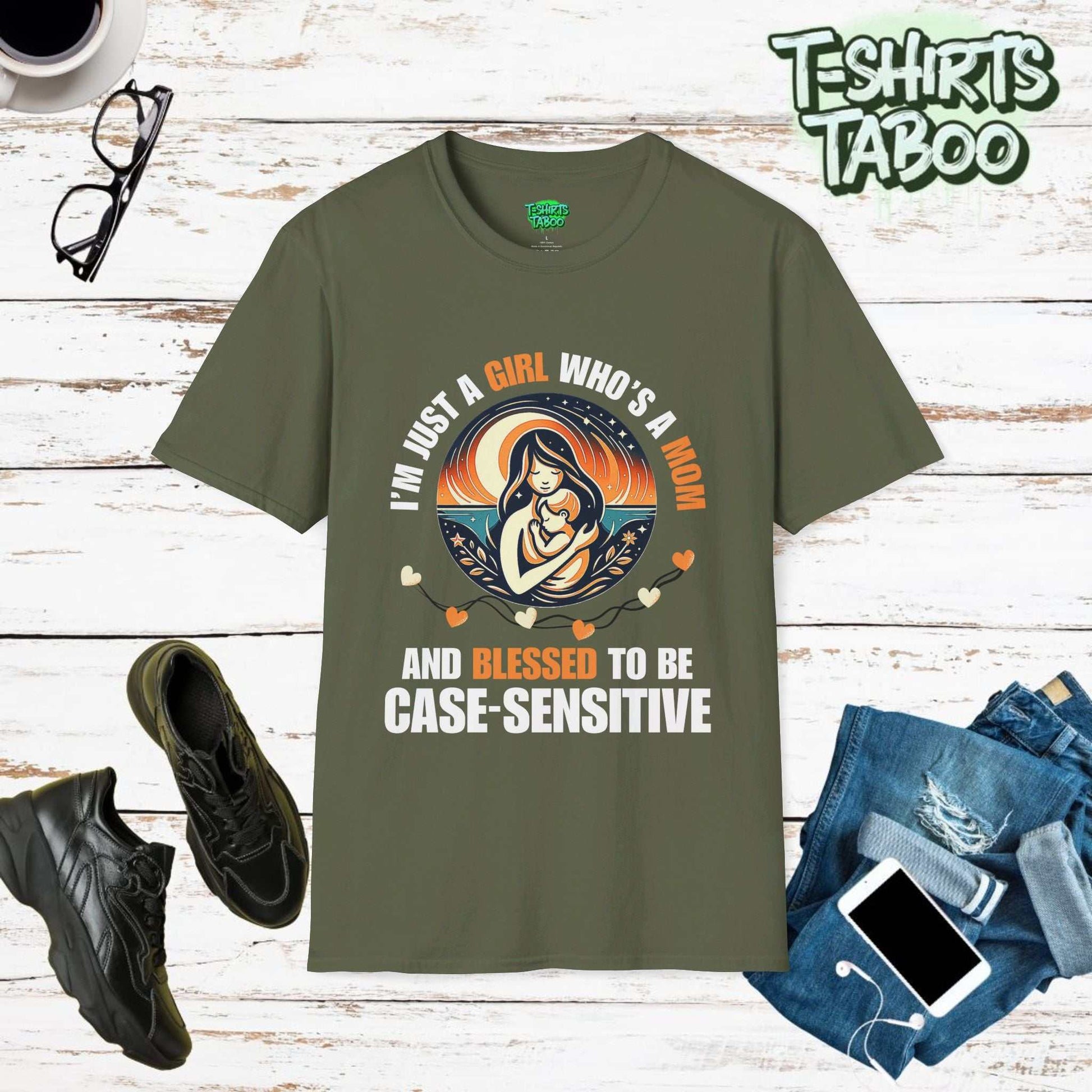 The word Case Sensitive is uniquely used in this tee by T-shirts Taboo. I'm just a girl who is a Mom and blessed to be case sensitive, A round graphic of Mom and kid