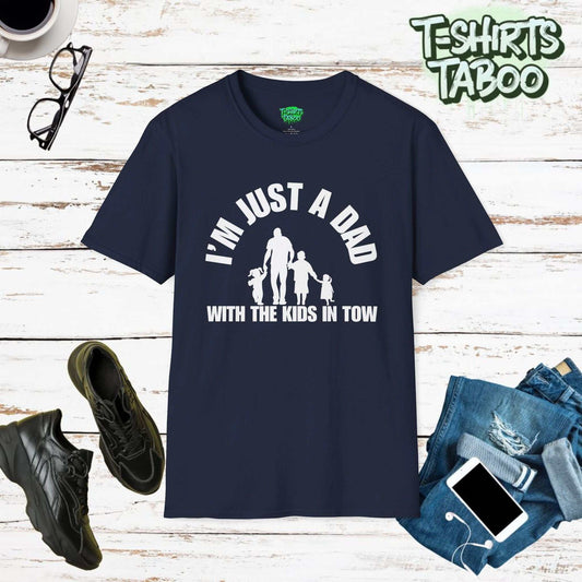 Fun tee featuring the slogan I’m just a Dad with the kids in tow.. Clear and bold statement t-shirt with a silhouette graphic of Dad walking with his kids. For dads.