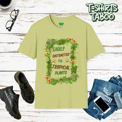 Our Range of Tropical Style Gardening tees. This tee is featuring a stunning display of tropical plants design with bold slogan Easily Distracted by Tropical Plants.