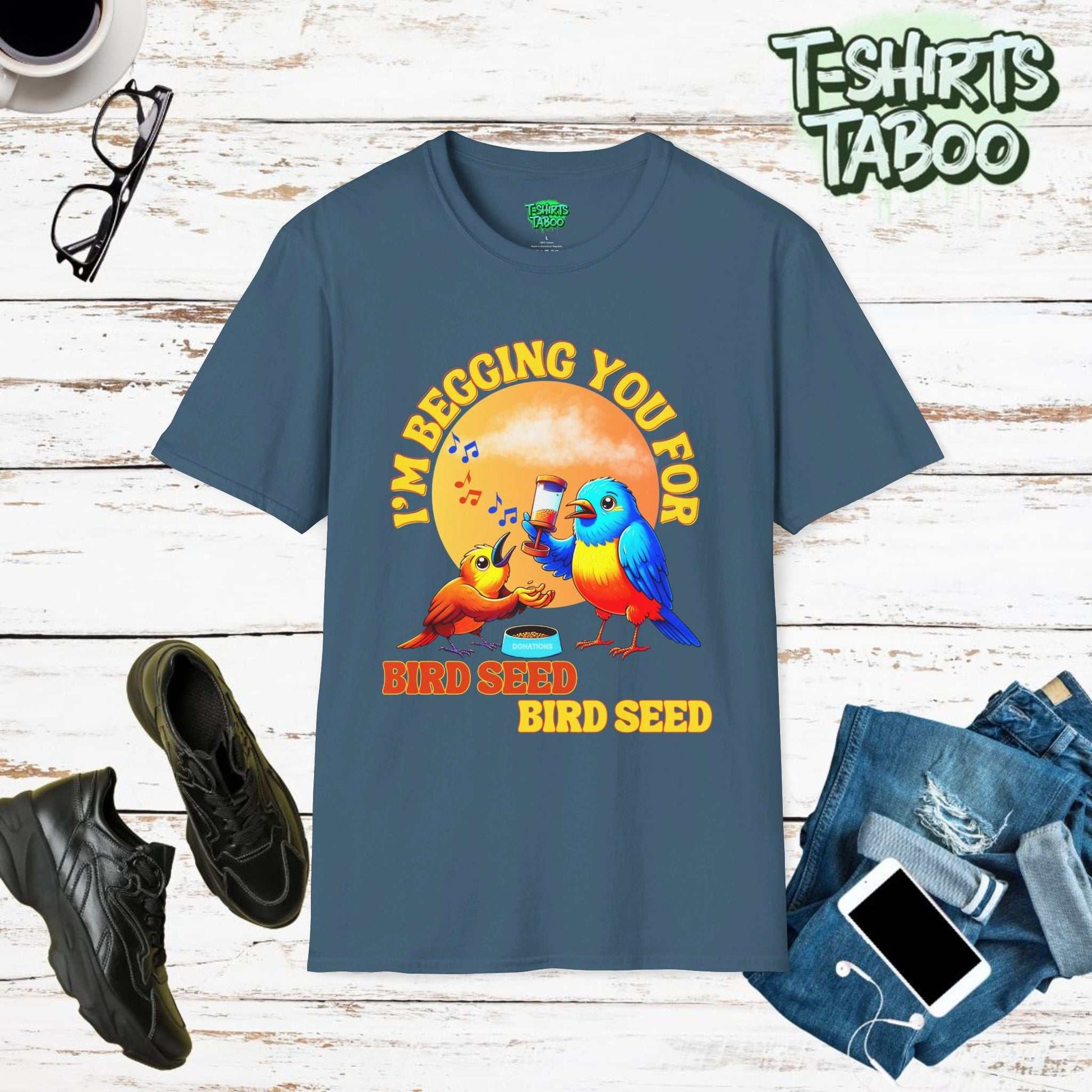 T-shirt with slogan I’m begging you for bird seed bird seed. Also has bright vibrant graphic of two birds, one begging the other for bird seed. Ideal For Bird Lover