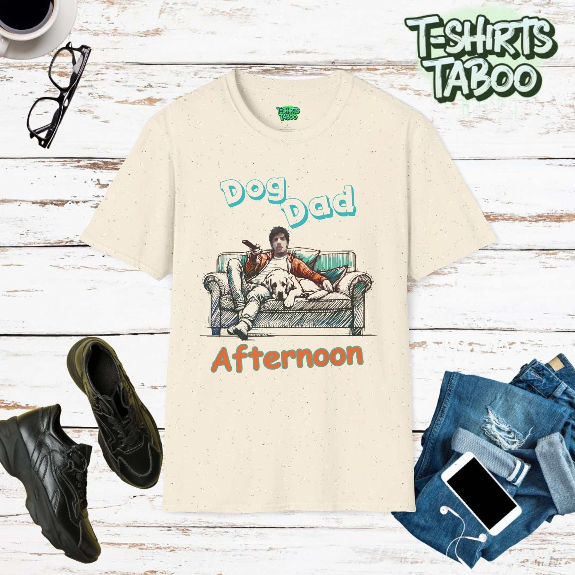 Fathers Day unique tee by T-shirts Taboo featuring the slogan Dog Dad afternoon and an image of a Dad on the sofa with a dog with him watching the football on the tv