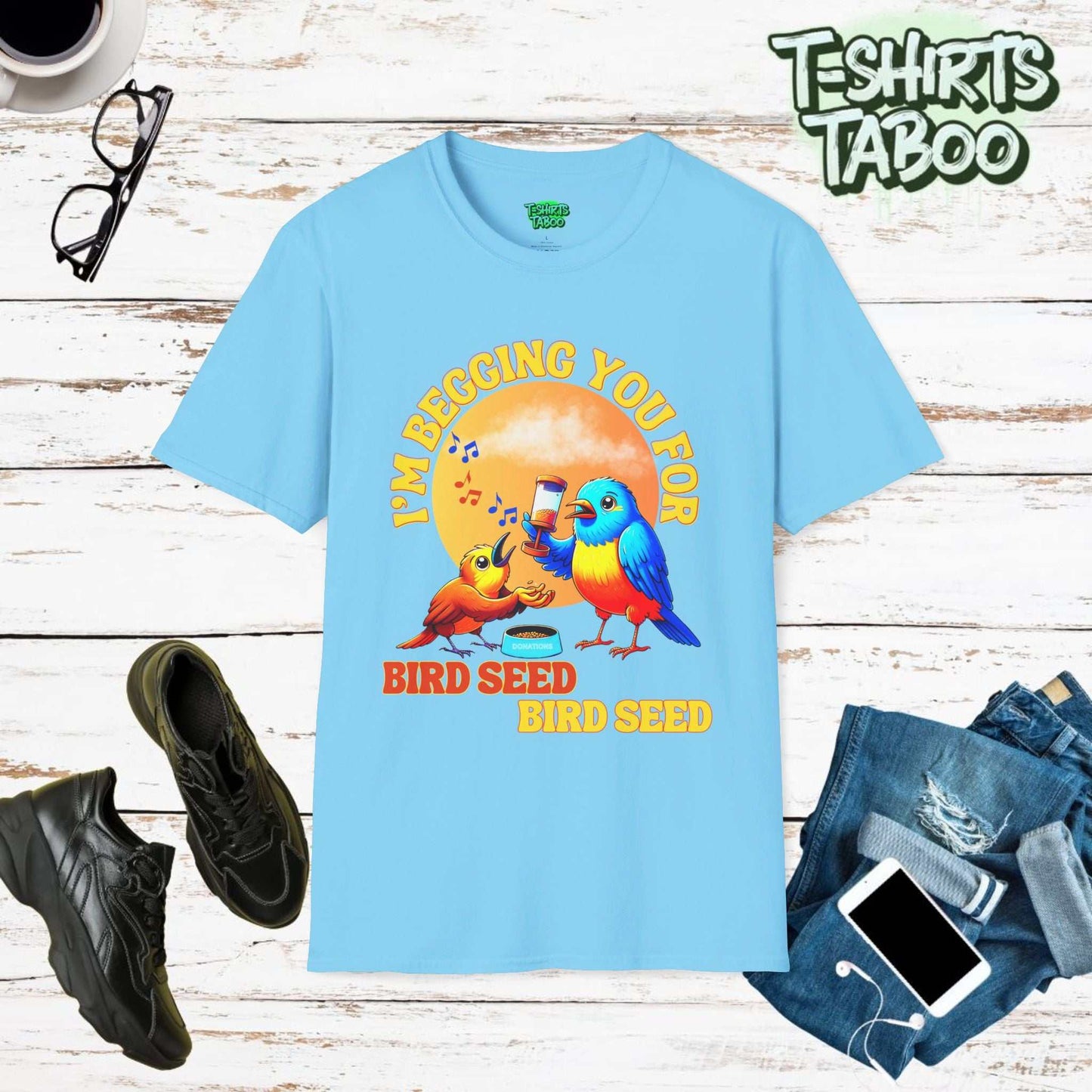 T-shirt with slogan I’m begging you for bird seed bird seed. Also has bright vibrant graphic of two birds, one begging the other for bird seed. Ideal For Bird Lover