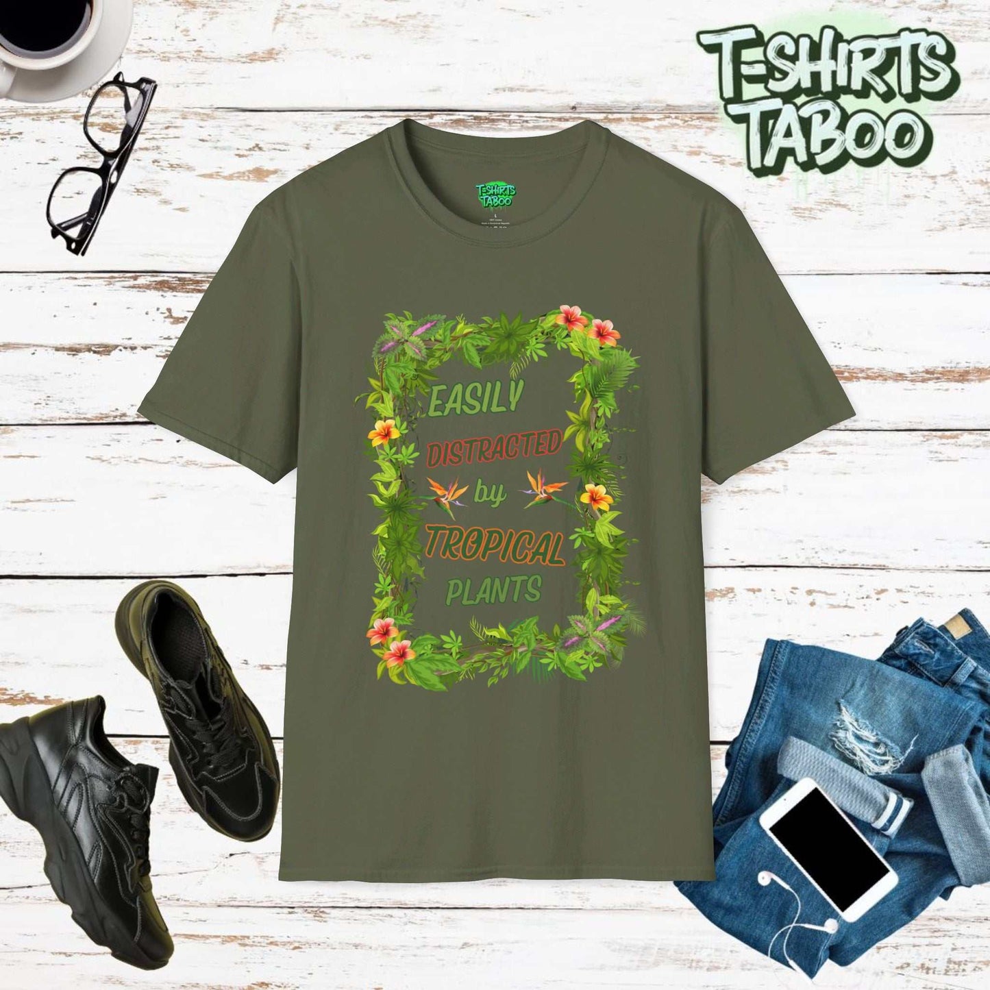 Our Range of Tropical Style Gardening tees. This tee is featuring a stunning display of tropical plants design with bold slogan Easily Distracted by Tropical Plants.