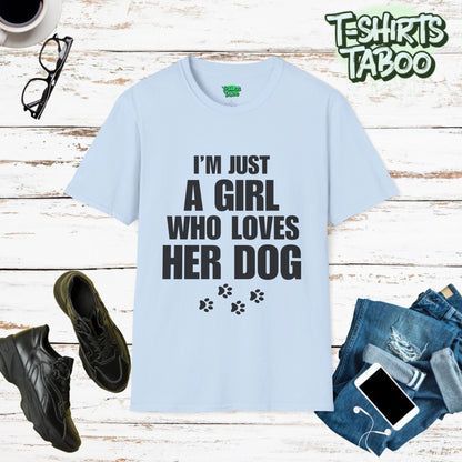 Dogs, Stylish and unique T-shirt by T-shirts Taboo showing the slogan I’m just a girl who loves her dog. Also features some paw prints graphics underneath the text.