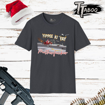 Treat your holiday wardrobe to our Die Hard Christmas Shirts, with a reamagined final scene involving a bad Santa with a bag of stolen cash. Unique to T-shirts Taboo. Grey t-shirt