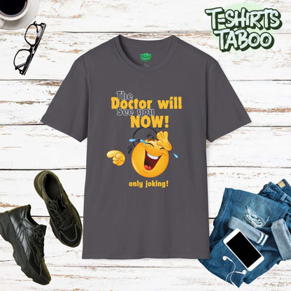 The Doctor Will See You Now t-shirt from T-Shirts Taboo features a bold slogan "The Doctor Will See You Now" prominently displayed across the front. Piss take shirt.