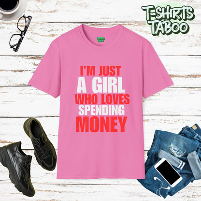 Stylish and unique, bold statement T-shirt by T-shirts Taboo showing the slogan I’m just a girl who loves spending money. Clear and bold text only statement t-shirt.