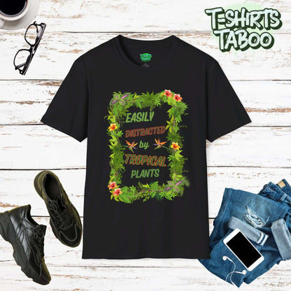 Our Range of Tropical Style Gardening tees. This tee is featuring a stunning display of tropical plants design with bold slogan Easily Distracted by Tropical Plants.