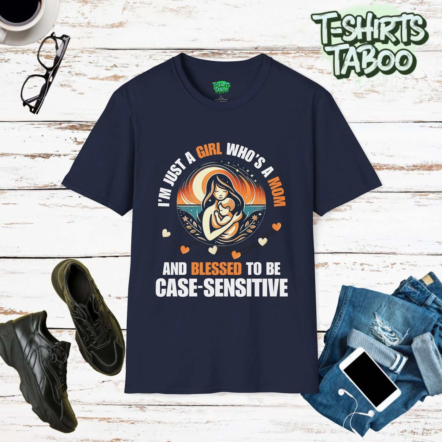 The word Case Sensitive is uniquely used in this tee by T-shirts Taboo. I'm just a girl who is a Mom and blessed to be case sensitive, A round graphic of Mom and kid