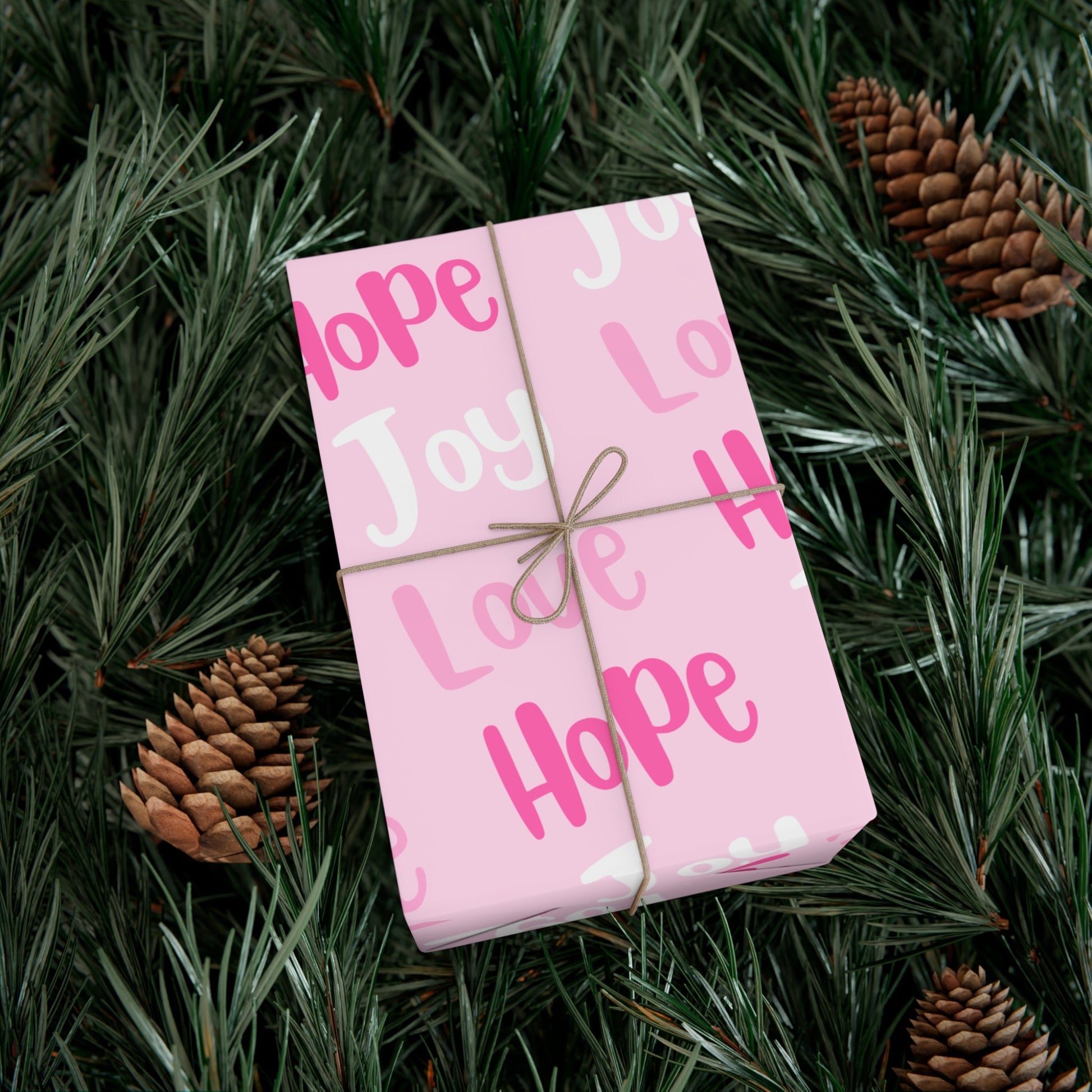 Make your holiday season sparkle with this vibrant pink Christmas wrapping paper roll! Designed with the festive faith words Joy, Love, and Hope in bright,  Avalilable in 3 sizes - 30 x 20 inch 30 x 72 inch and 30 x 144 inch