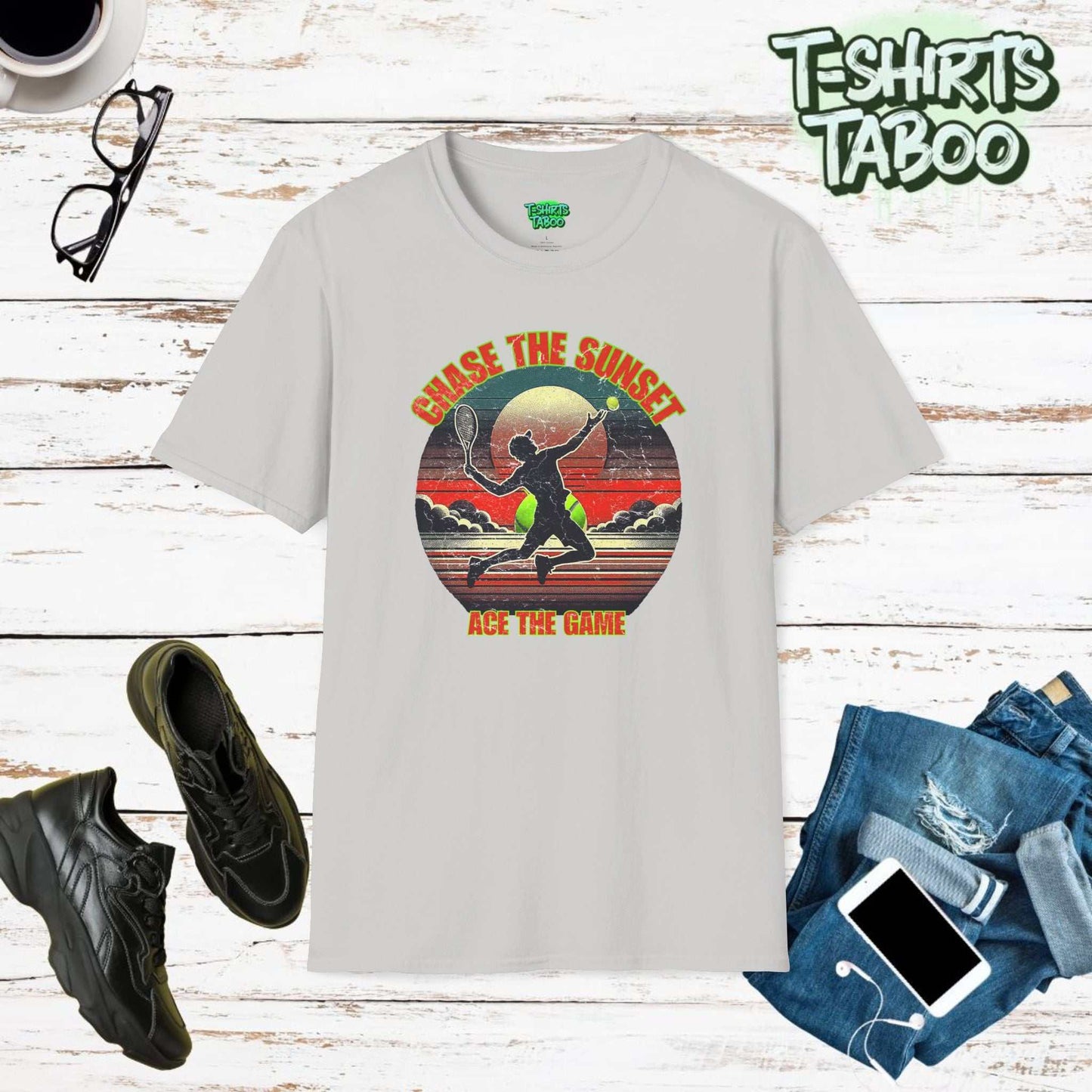 Stylish and unique tee by T-shirts Taboo with the slogan Chase the Sunset, Ace the Game, &   a silhouette tennis player serving in front of a classic sunset graphic.