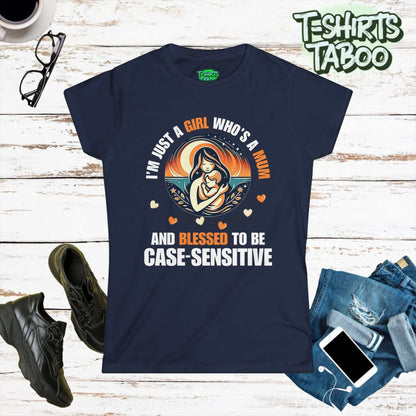 Unique t-shirt by T-shirts Taboo with the slogan I'm just a girl who is a Mum and blessed to be case sensitive. Also has a round badge like graphic with Mum and kid.