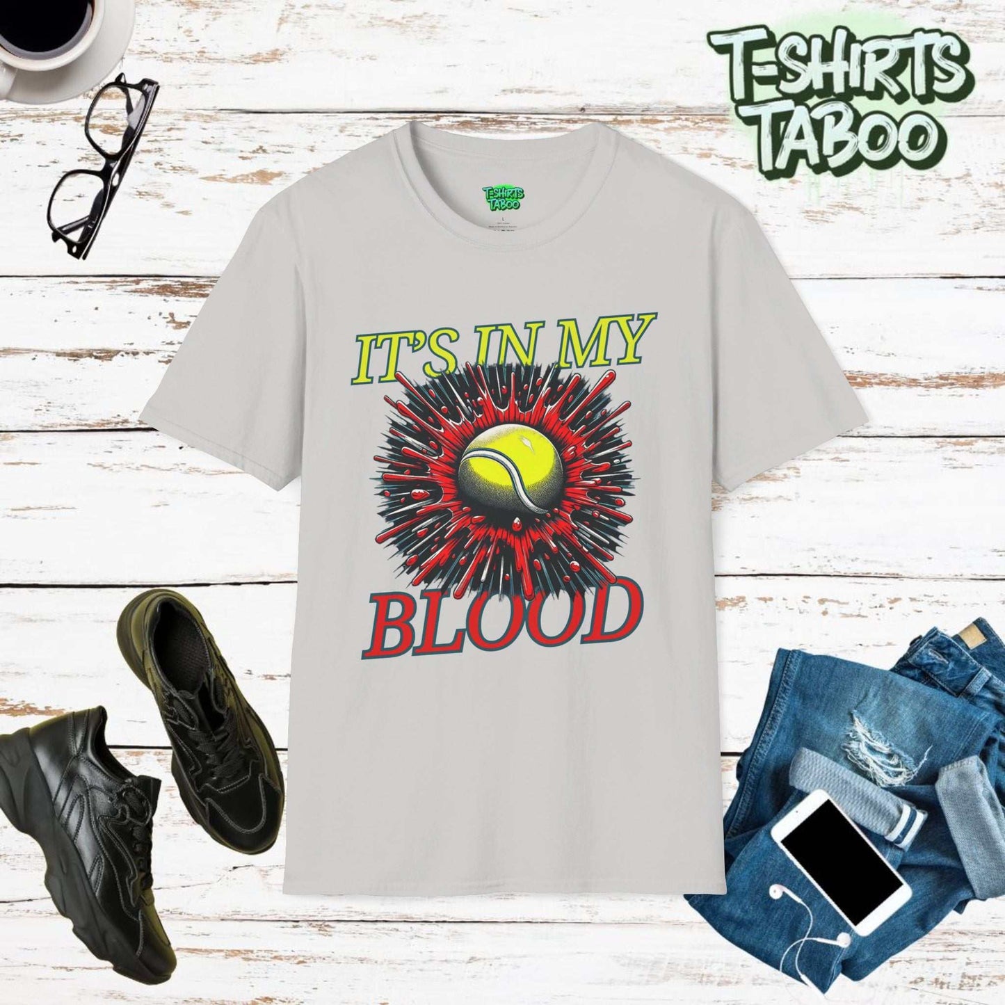 Stylish Tee by T-shirts Taboo featuring the slogan It's in my blood. Also has a graphic of Tennis ball exploding through the shirt 3d style. Perfect for Tennis fans.