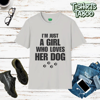 Dogs, Stylish and unique T-shirt by T-shirts Taboo showing the slogan I’m just a girl who loves her dog. Also features some paw prints graphics underneath the text.