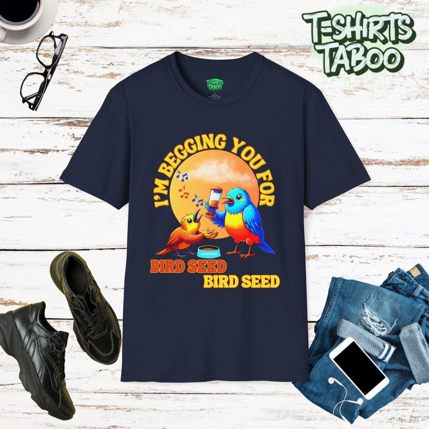 T-shirt with slogan I’m begging you for bird seed bird seed. Also has bright vibrant graphic of two birds, one begging the other for bird seed. Ideal For Bird Lover