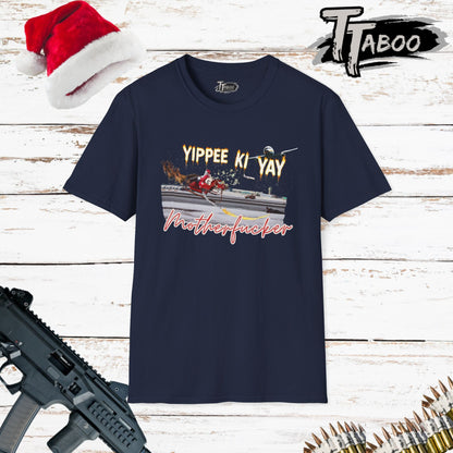 Treat your holiday wardrobe to our Die Hard Christmas Shirts, with a reamagined final scene involving a bad Santa with a bag of stolen cash. Unique to T-shirts Taboo. Navy t-shirt