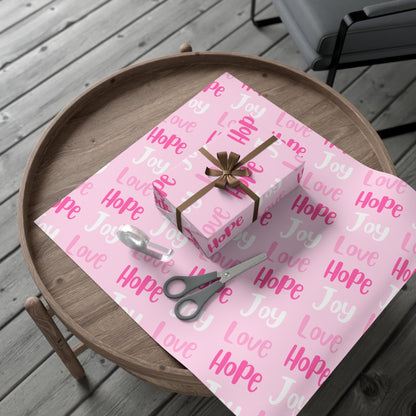 Make your holiday season sparkle with this vibrant pink Christmas wrapping paper roll! Designed with the festive faith words Joy, Love, and Hope in bright,  Avalilable in 3 sizes - 30 x 20 inch 30 x 72 inch and 30 x 144 inch